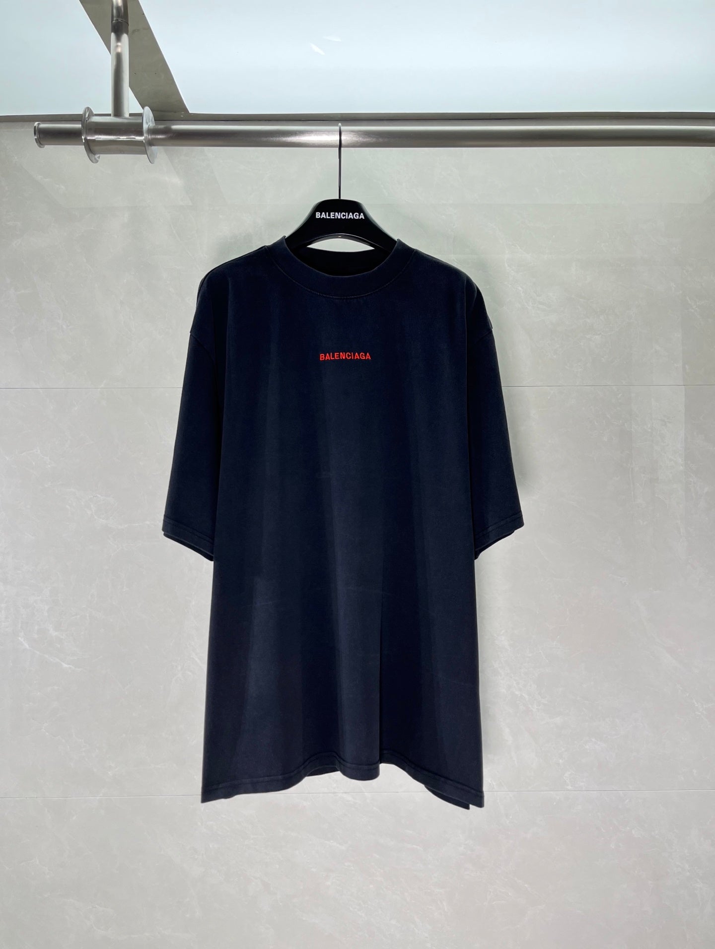 Balenciaga dark T-shirt with red logo print at chest