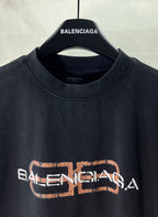 Balenciaga short-sleeve T-shirt, dark fabric with front neck logo and graphic print