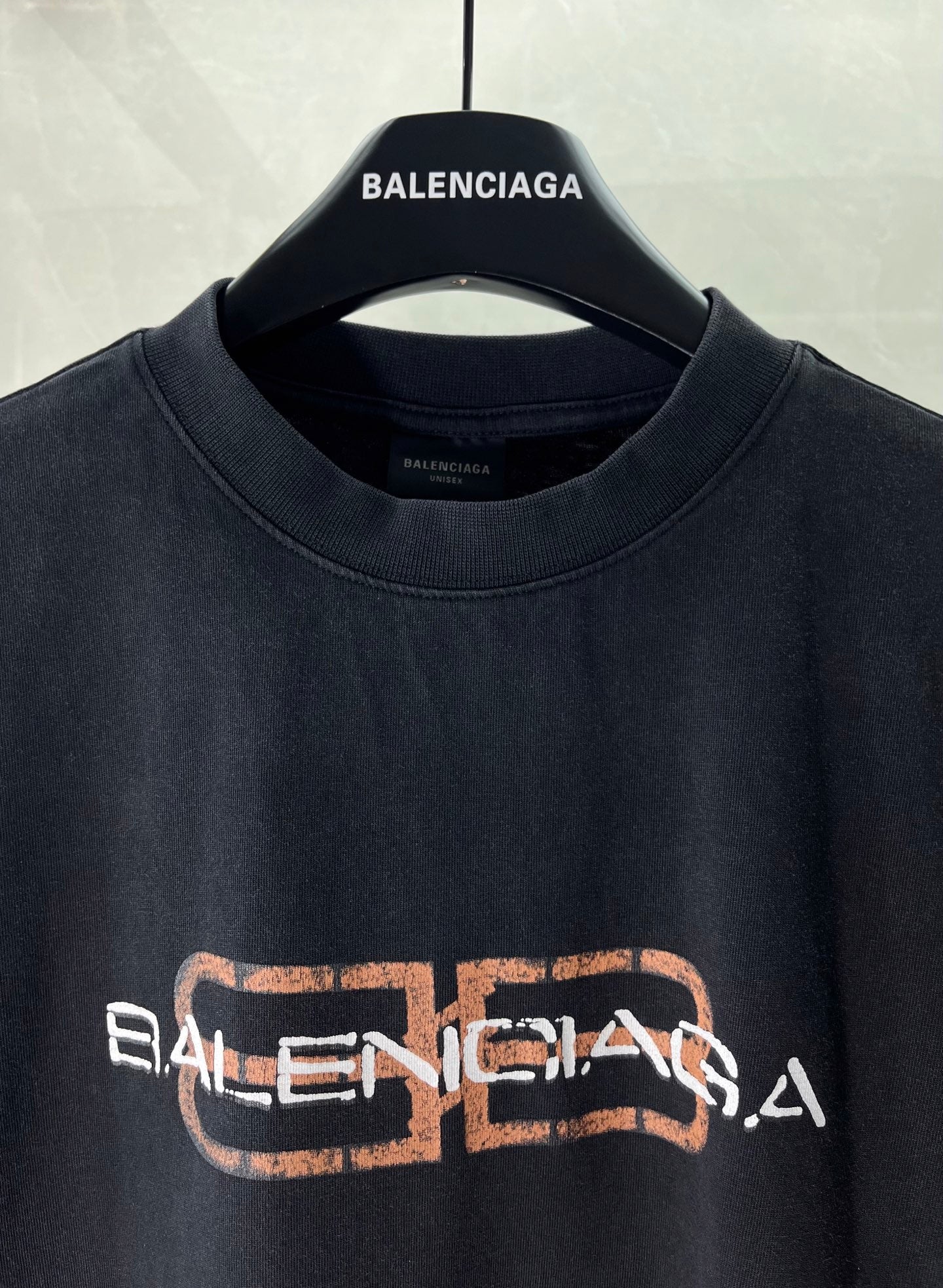 Balenciaga short-sleeve T-shirt, dark fabric with front neck logo and graphic print