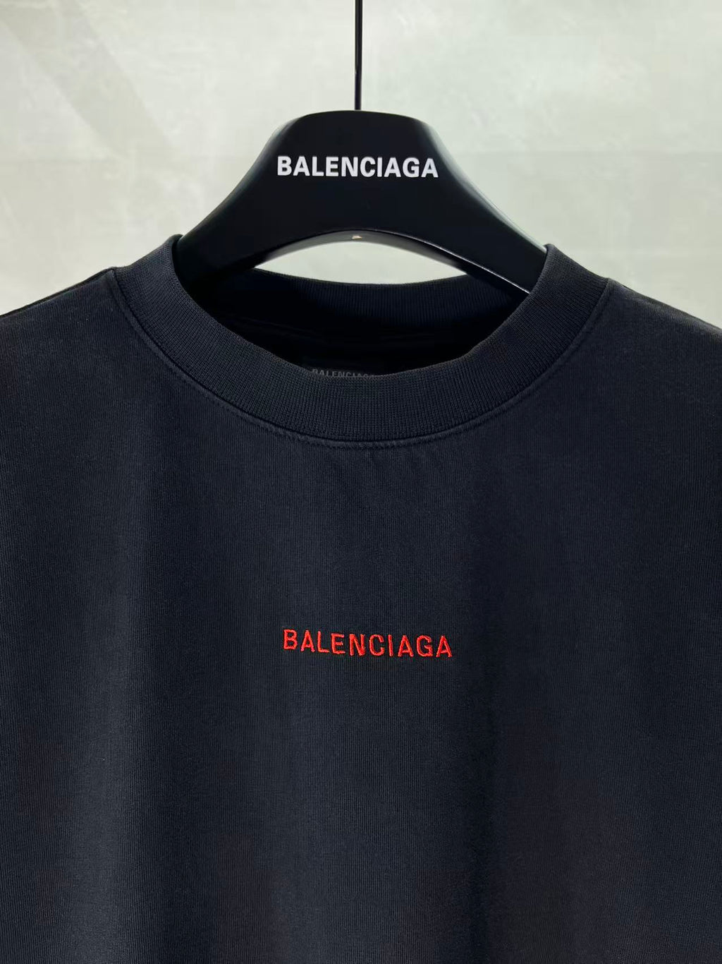 Balenciaga dark crewneck T-shirt with small red chest logo