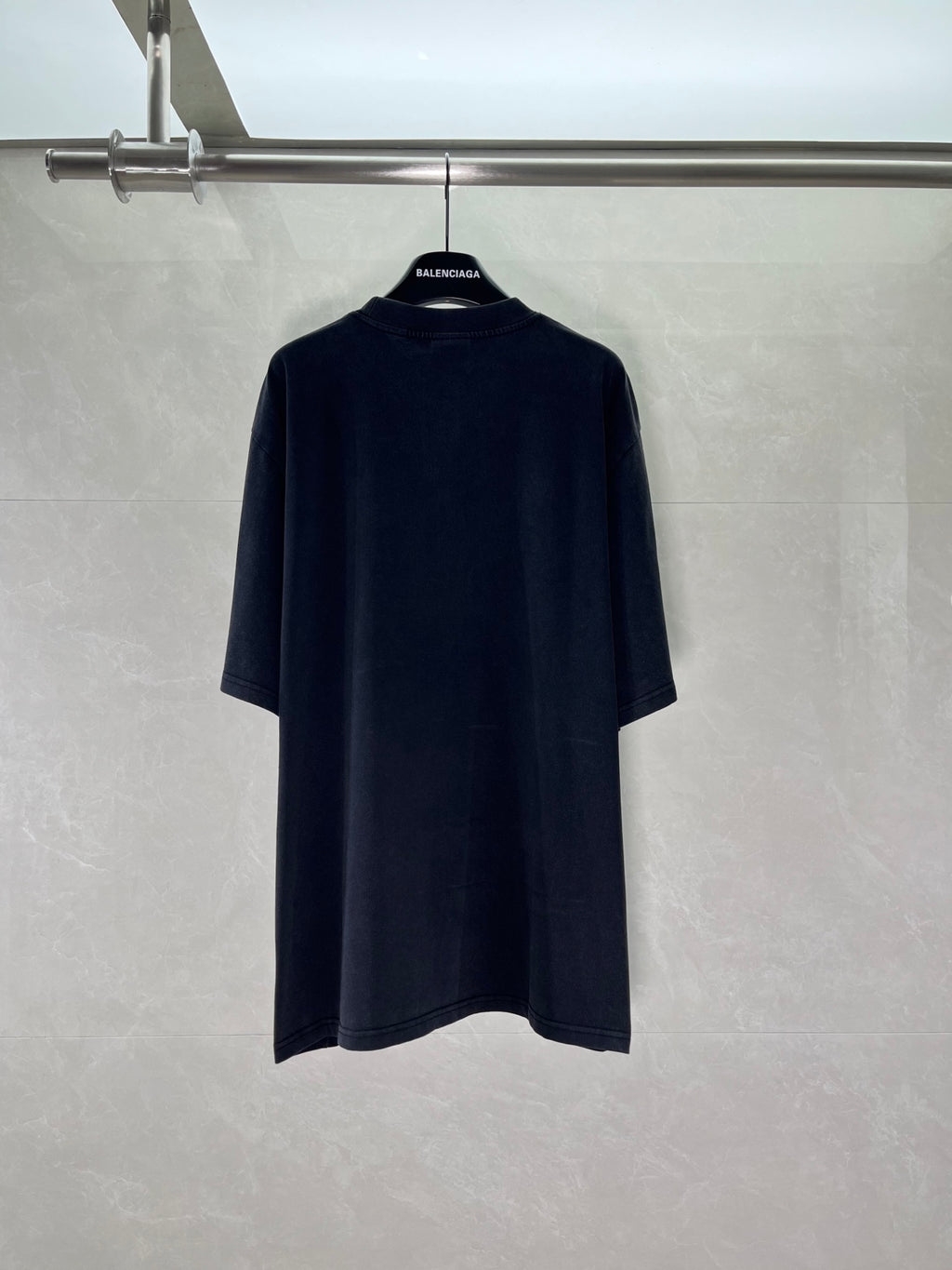 Balenciaga short-sleeve T-shirt in dark color, back view with crew neckline