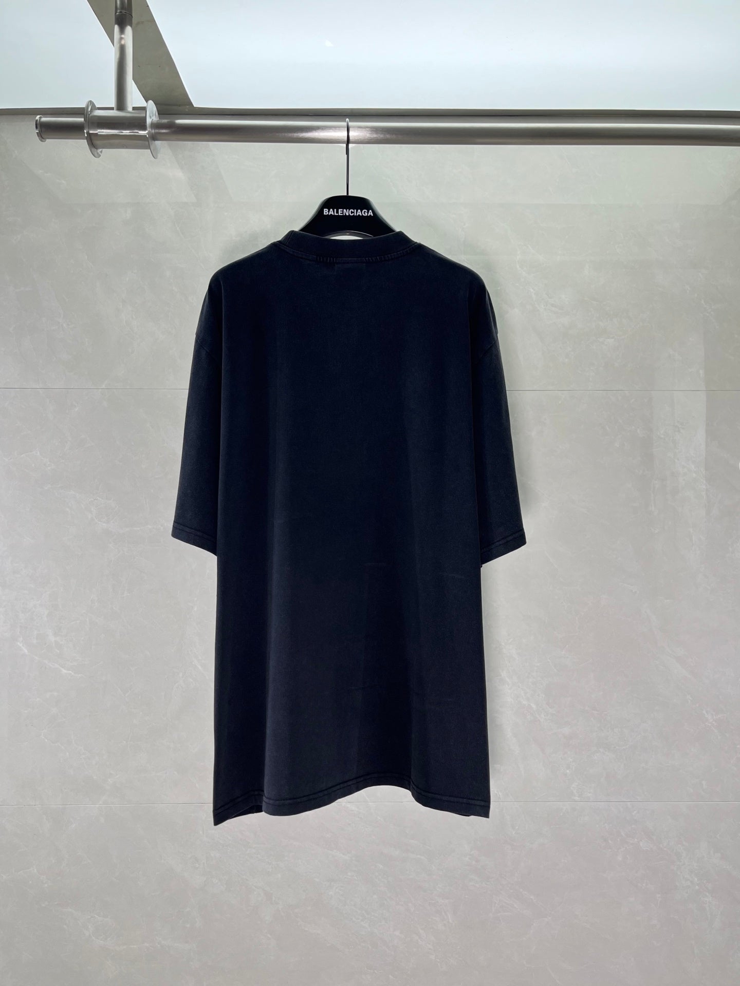 Balenciaga short-sleeve T-shirt in dark color, back view with crew neckline