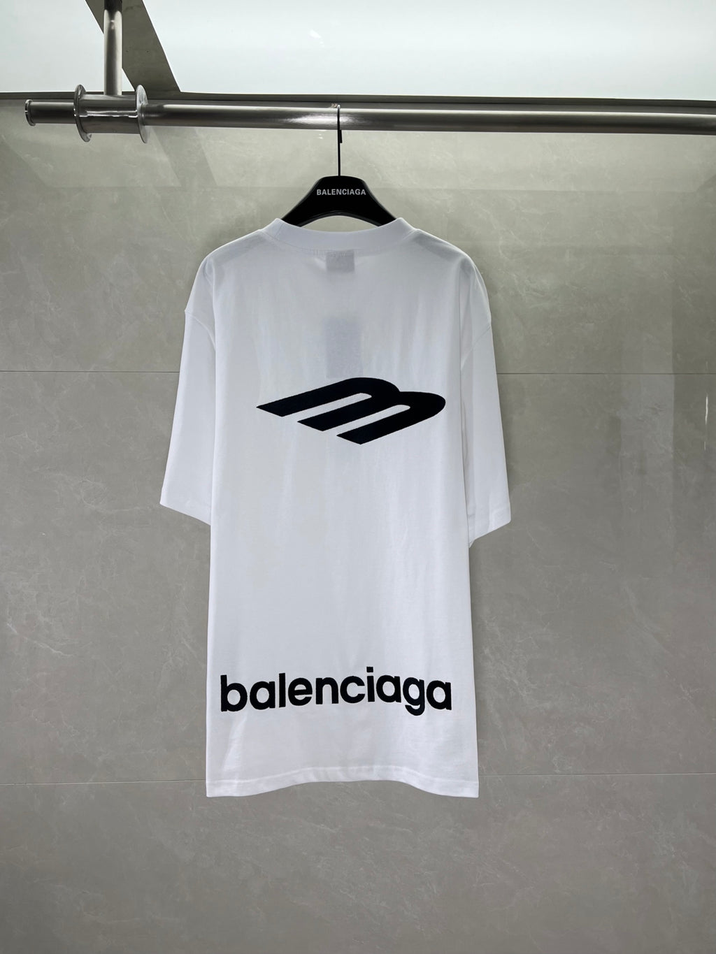 Balenciaga white T-shirt on hanger, large back logo and Balenciaga text