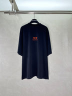 Black T-shirt with small red heart and Balenciaga logo on the chest