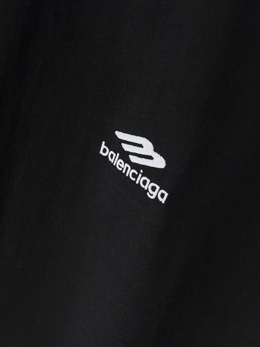 Black Balenciaga T-shirt fabric close-up with logo print