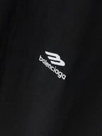 Black Balenciaga T-shirt fabric close-up with logo print