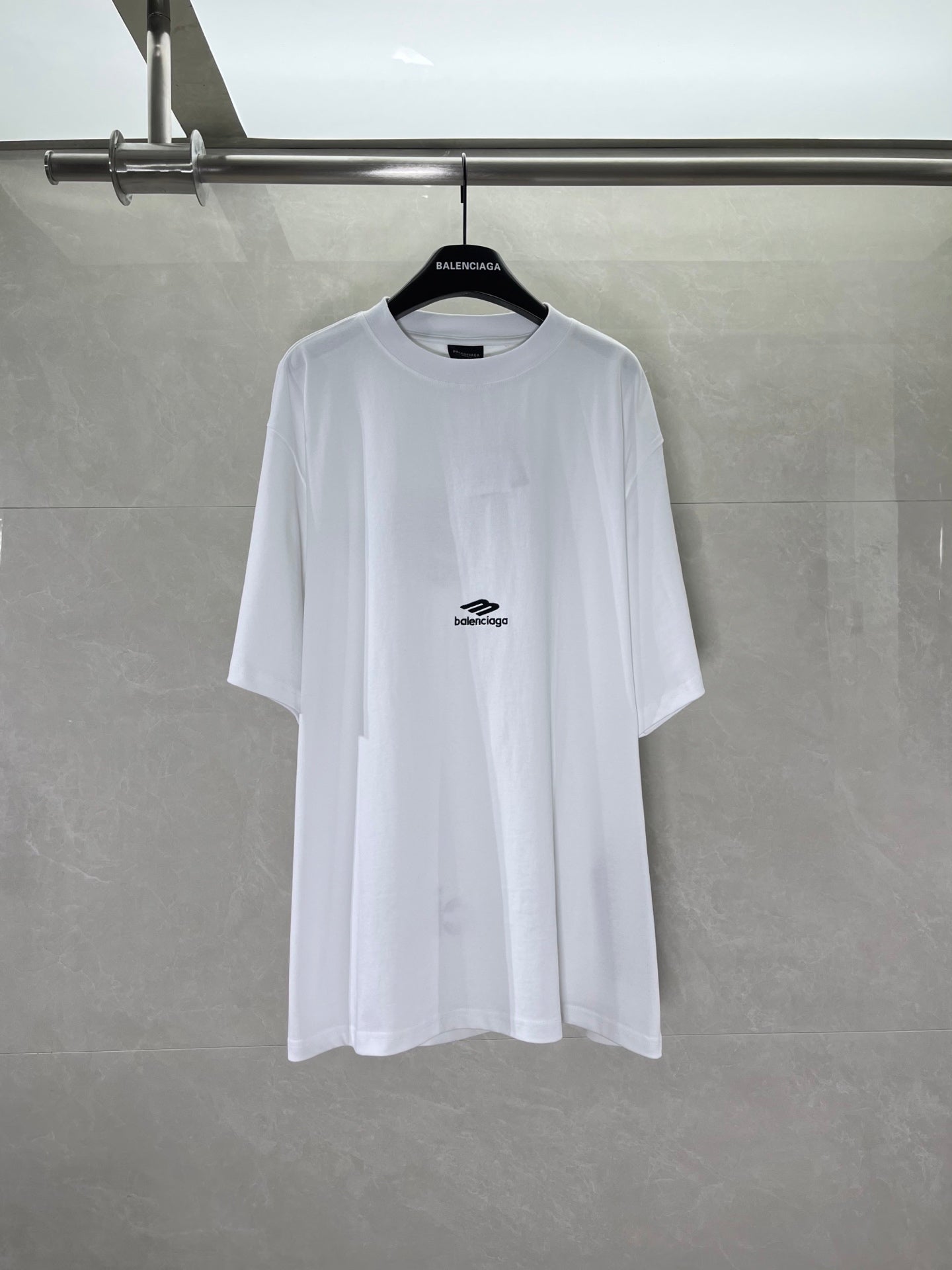 Balenciaga white T-shirt on hanger, small chest logo
