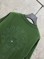 Green crew-neck T-shirt with large embroidered back symbol