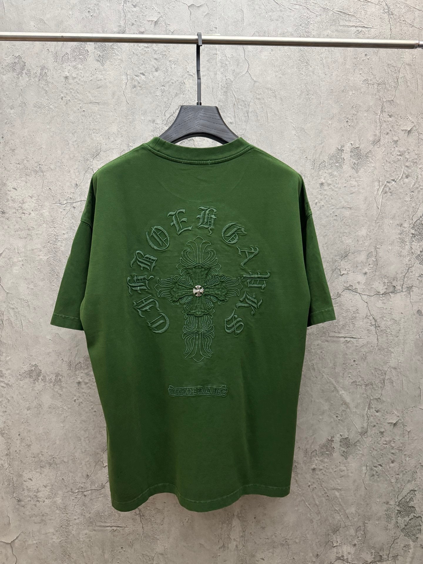 Green crew-neck T-shirt with large back graphic embroidery design