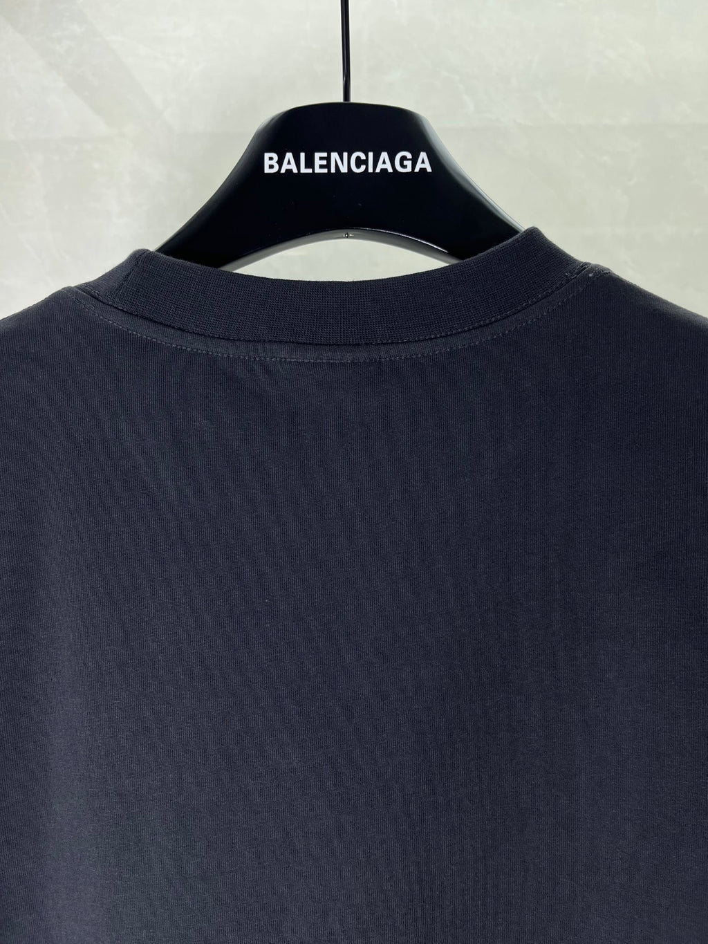 Balenciaga dark T-shirt back neckline with BALENCIAGA label