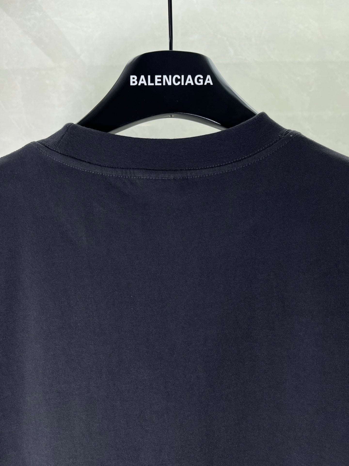 Balenciaga dark T-shirt back neckline with BALENCIAGA label