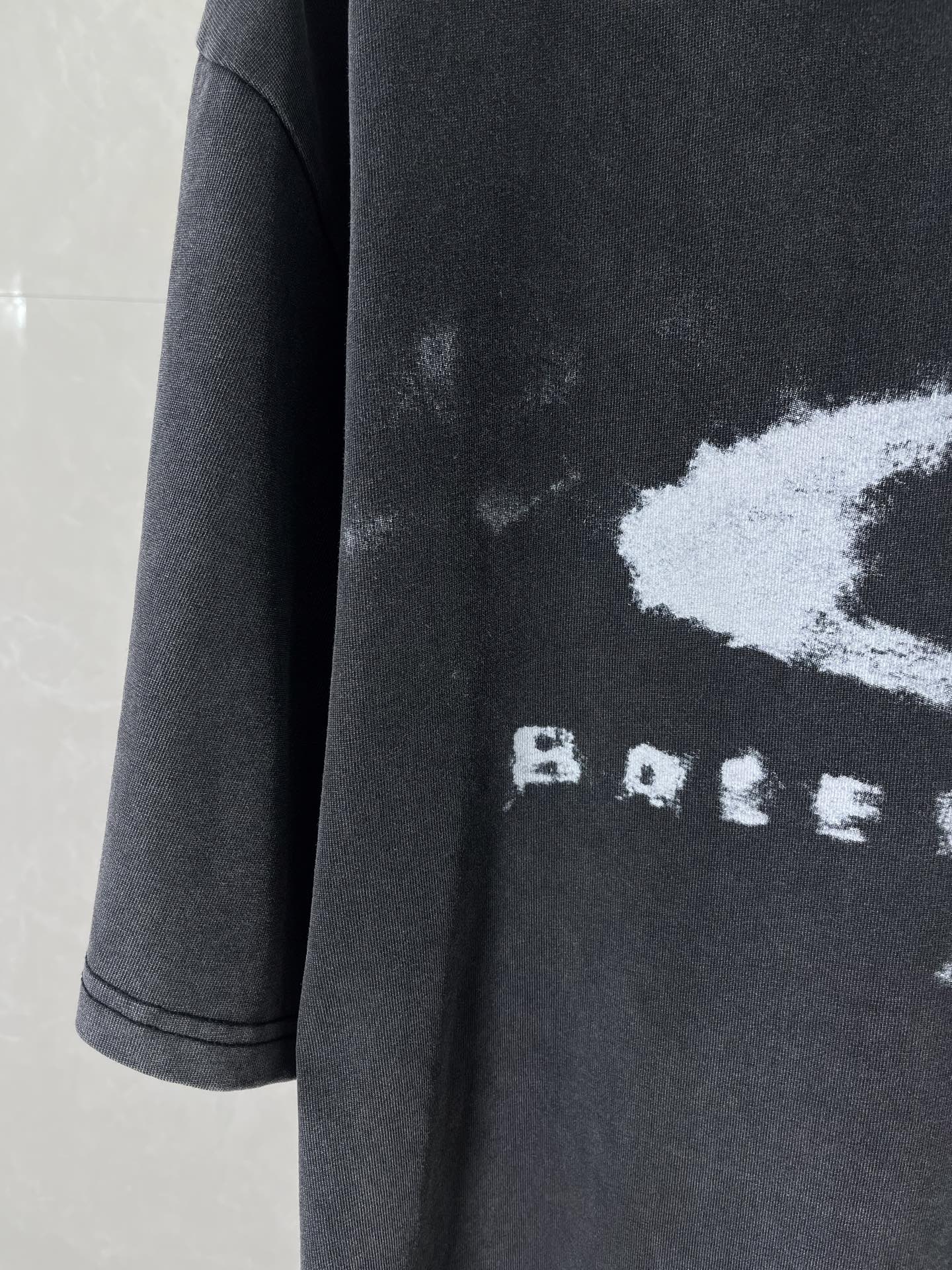 Balenciaga dark long T-shirt sleeve with white “RAVE” text print and graphic