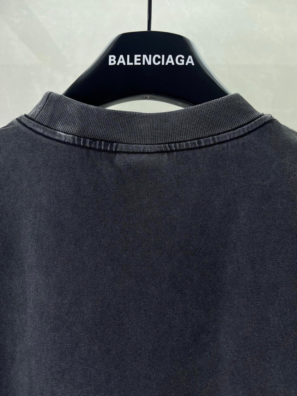 Balenciaga dark T-shirt crew neck with ribbed collar, shown from back