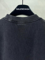 Balenciaga dark T-shirt crew neck with ribbed collar, shown from back