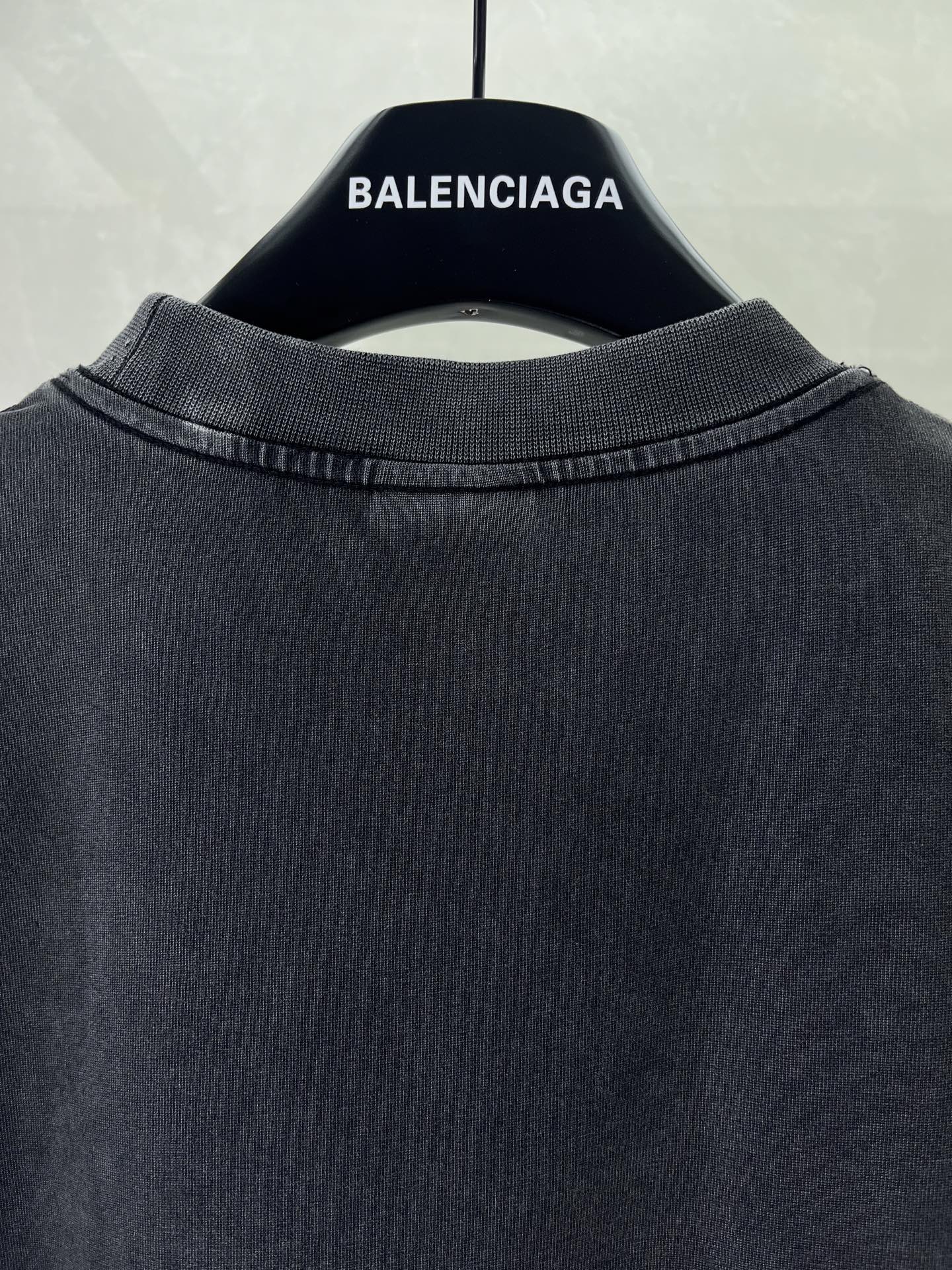 Balenciaga dark T-shirt crew neck with ribbed collar, shown from back