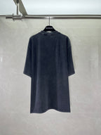 Balenciaga dark short-sleeve T-shirt from back view on a hanger