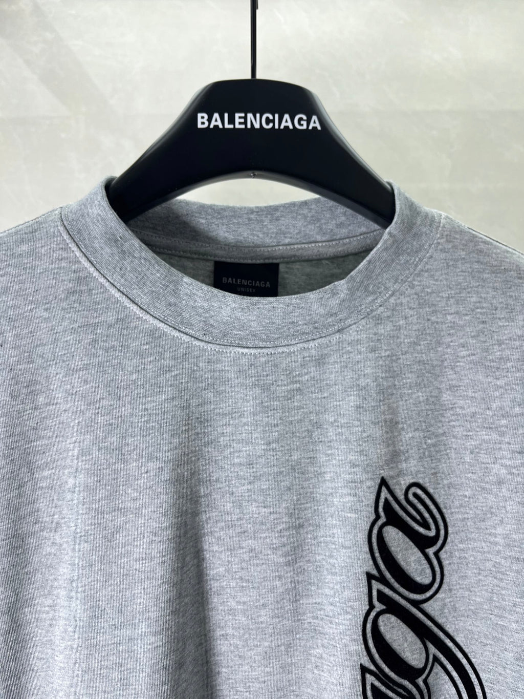 Heather gray crew-neck T-shirt with BALENCIAGA logo and black script graphic