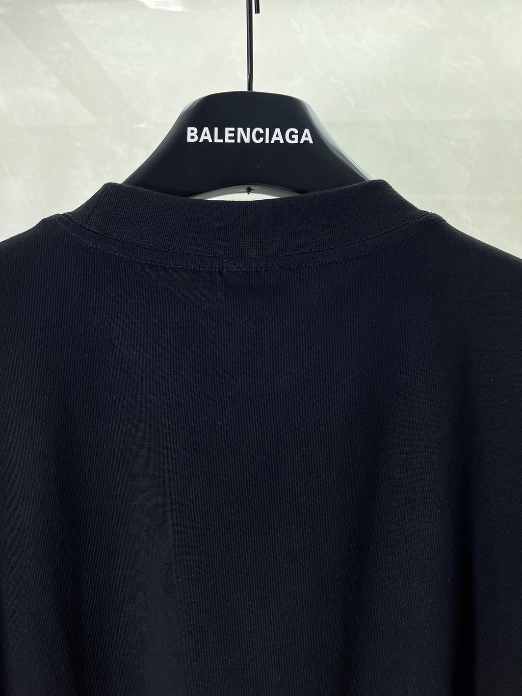 Balenciaga black T-shirt back neckline with small white logo text