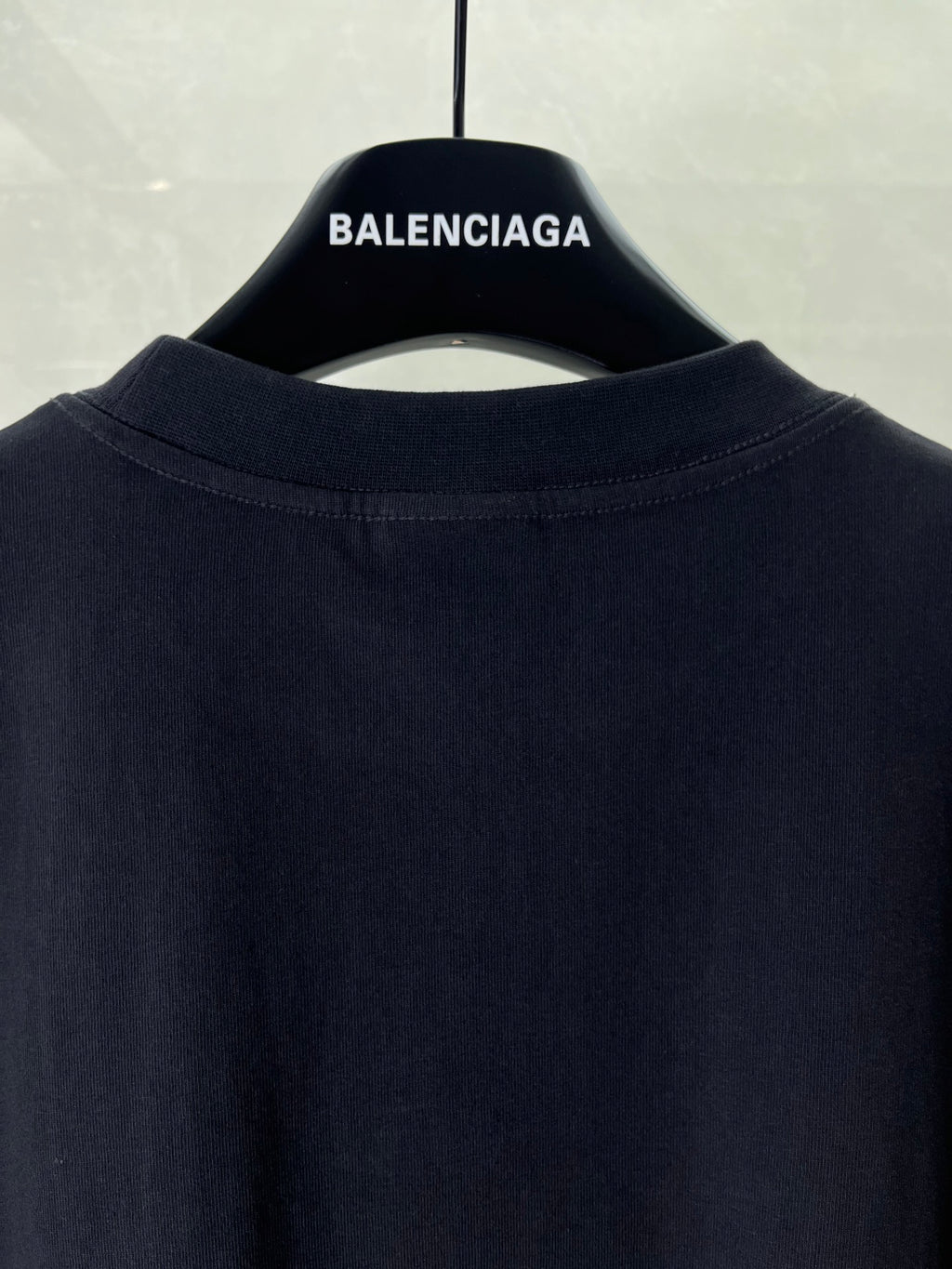 Dark T-shirt back with crew neckline and top-center BALENCIAGA text