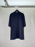 Navy short-sleeve crewneck T-shirt on hanger, plain back with subtle logo