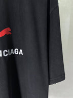 Dark navy T-shirt sleeve and hem with partial BALENCIAGA logo print