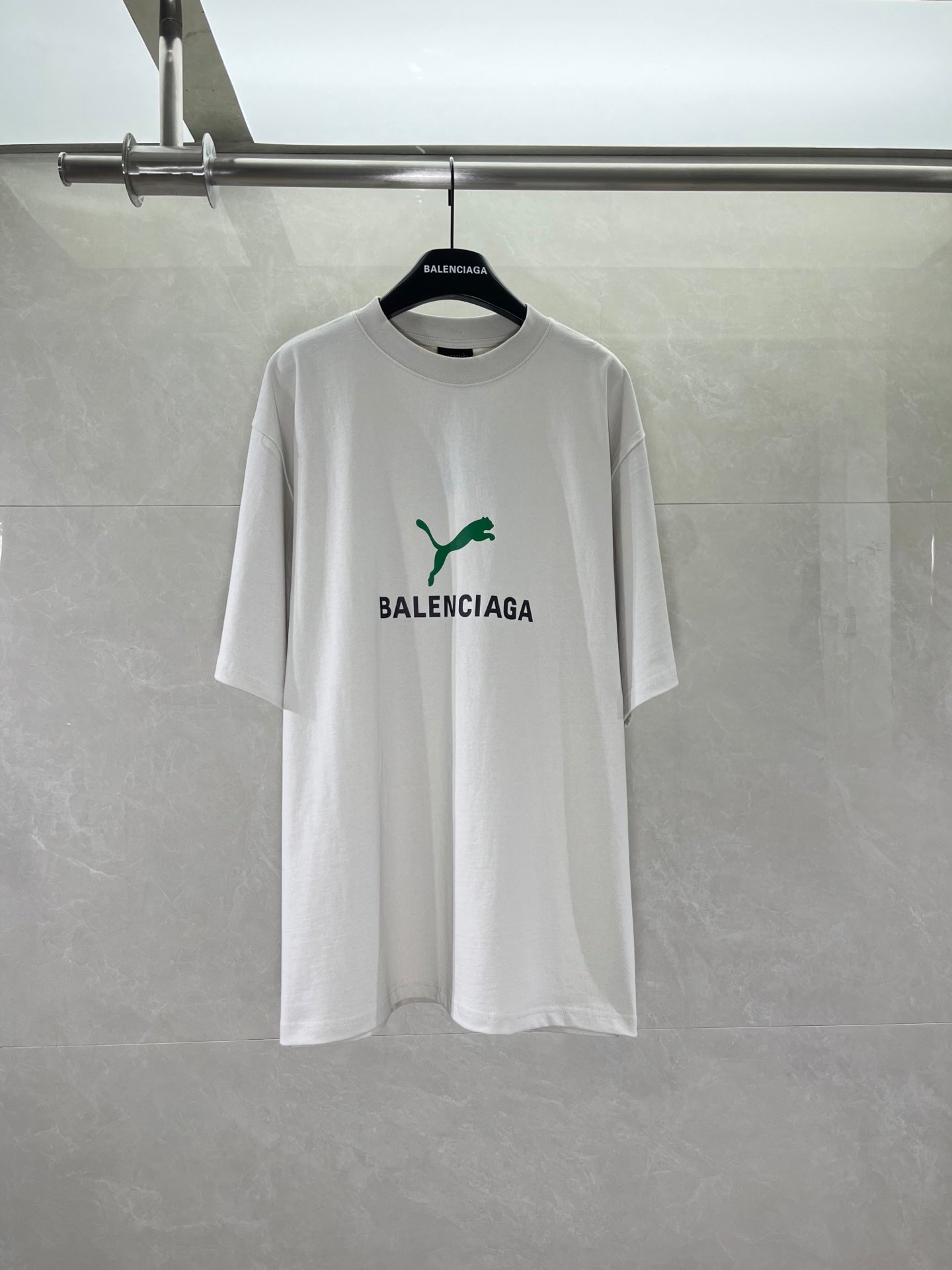 White Balenciaga short-sleeve T-shirt with green puma graphic and BALENCIAGA print