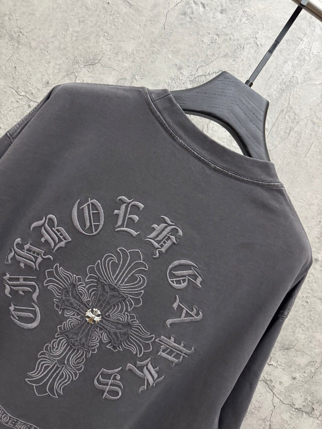 Dark gray T-shirt with large back cross emblem and ornate embroidery detail