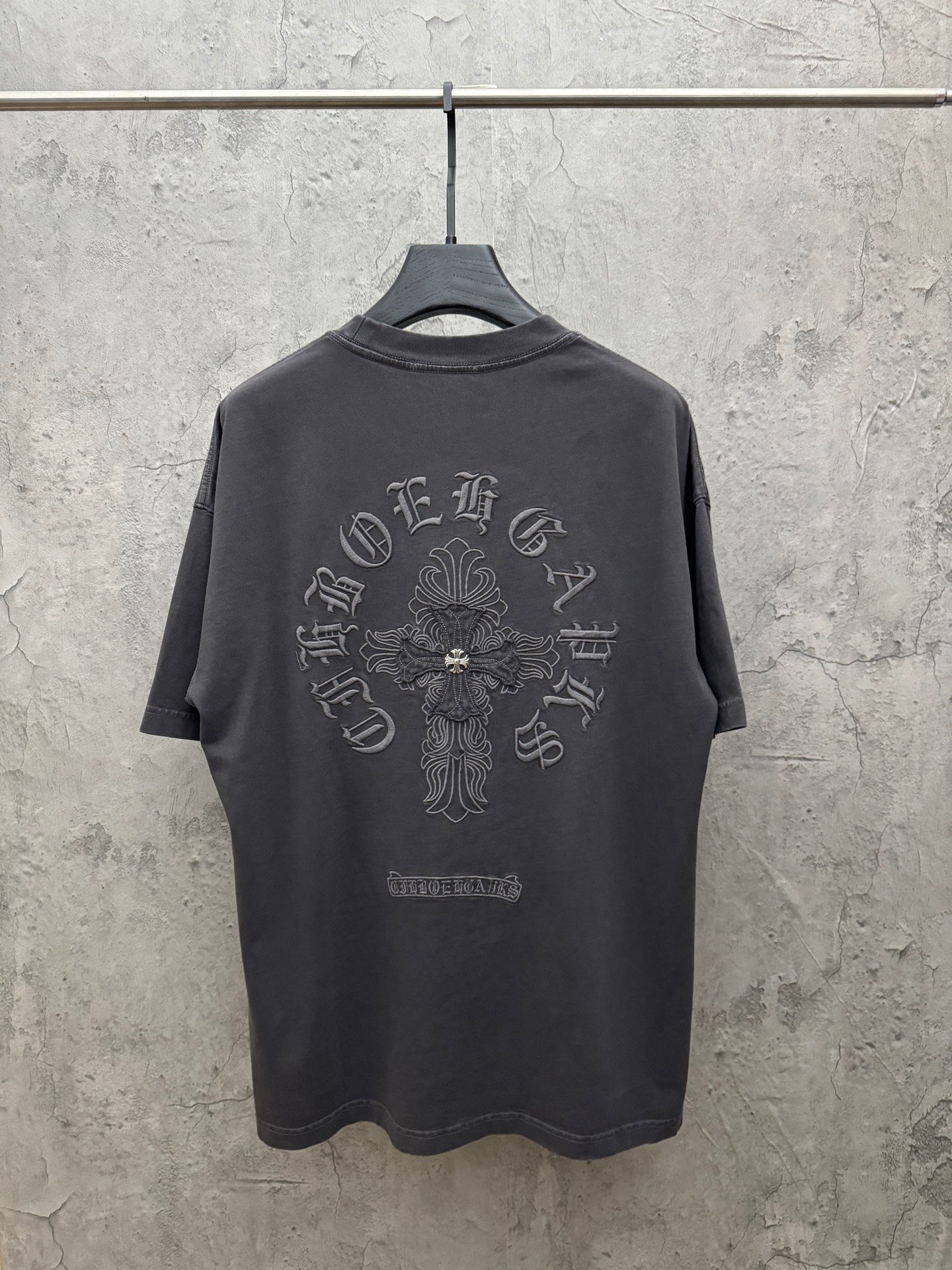 Dark gray short-sleeve crewneck T-shirt with large back cross emblem print