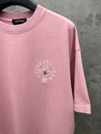 Light pink short-sleeve T-shirt with small central chest embroidery