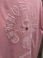 Light pink T-shirt back embroidery detail with beaded center decoration