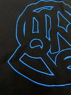 Black T-shirt close-up of blue outline logo graphic