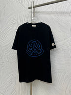 Black Moncler short-sleeve T-shirt with blue outline logo graphic