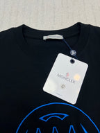 Black T-shirt with blue line logo graphic and neck tag detail