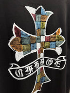 Black T-shirt back close-up of multicolor cross graphic and ribbon