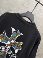 Black short-sleeve T-shirt with partial multicolor cross graphic on chest