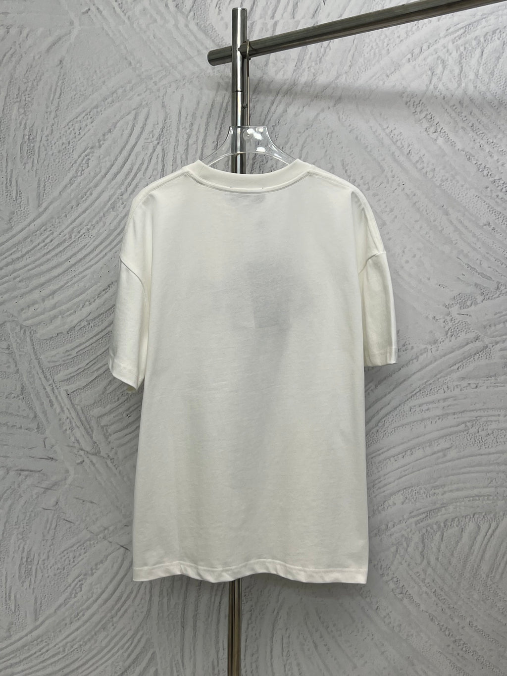 White Gucci crewneck T-shirt on hanger, plain back