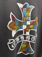 Close-up of multicolor cross graphic with ribbon text on dark gray T-shirt back