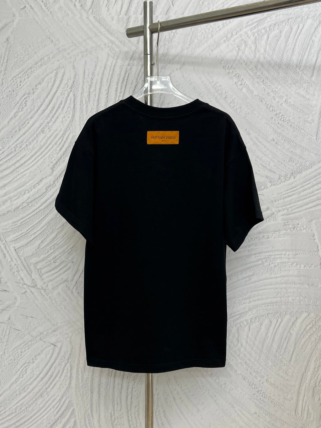 Louis Vuitton black T-shirt with small orange inner-neck label