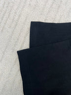 Louis Vuitton black T-shirt fabric and side seam close-up