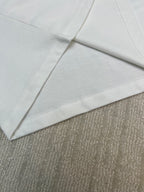 White T-shirt sleeves and side seam detail
