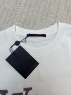 White Louis Vuitton T-shirt neckline with attached brand tag