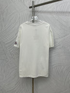 White Moncler short-sleeve T-shirt on hanger, relaxed fit, crew neck