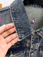 Louis Vuitton denim jacket with metal snap buttons and stitched cuffs