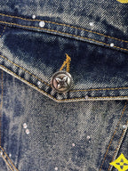 Denim jacket buttoned pocket with metal star emblem and contrast stitching