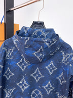 Blue hooded jacket with white tree diamond print from front