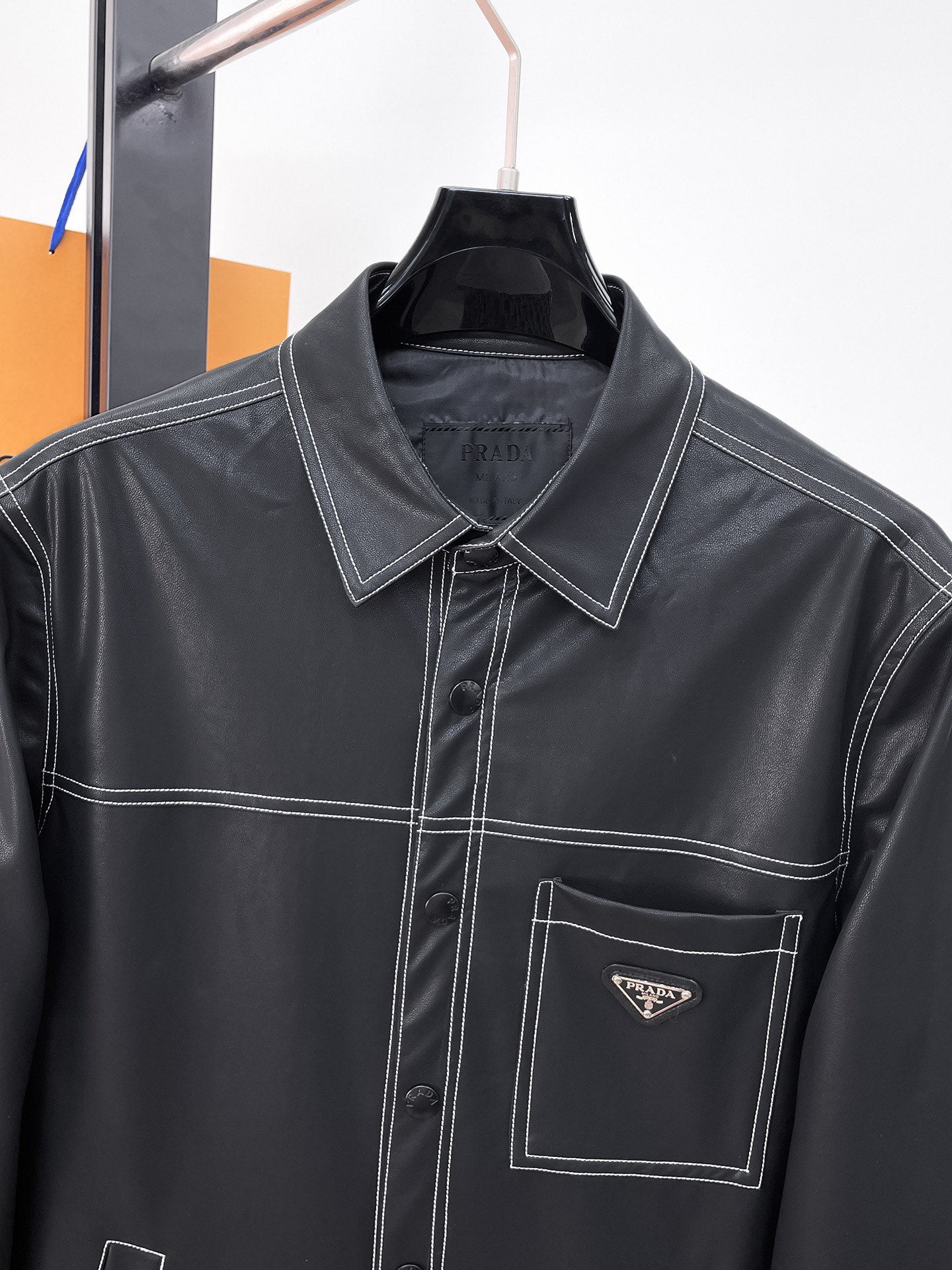 Prada long-sleeve button-up shirt, dark with contrast stitching and chest pocket