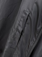 Long coat with zipper and stitched side panel seam