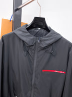 Prada long black hooded windbreaker jacket with drawstring hood and red logo