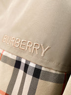 Long coat chest logo embroidery reading BURBERRY