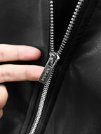 Black leather jacket zipper with silver pull and PRADA engraving